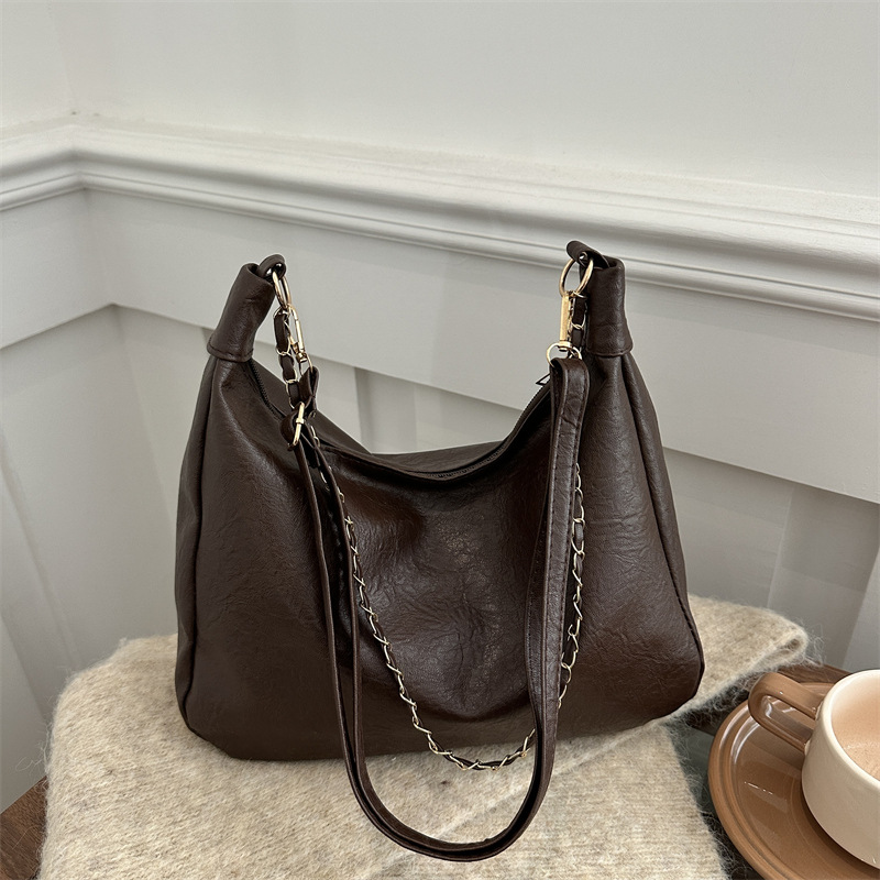 2024 bolso de estudiantes coreano para mujeres de gran capacidad nicho versátil bolso de hombro de alto nivel bolso de cubo de cadena