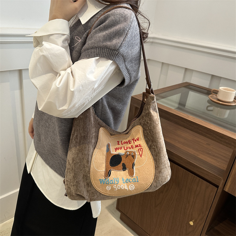 Bolso Tote de trabajo de gran capacidad en otoño e invierno para mujer 2024 nuevo bolso de mensajero de tres manos de dibujos animados