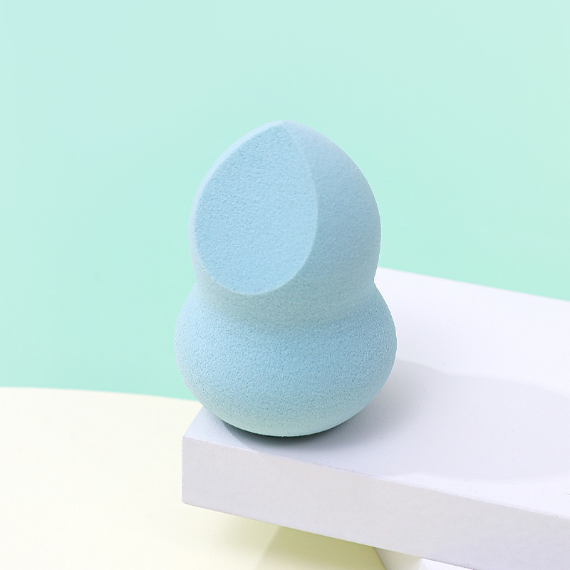 Fábrica personalizada cortar un cuchillo de polvo de maquillaje de huevo no comer polvo en forma de calabaza de poliuretano esponja de maquillaje de huevo de maquillaje