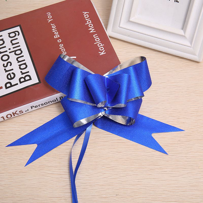 Cruz-frontera Venta caliente de alta gama de decoración del hogar de regalo de la flor embalaje arco mano tirar flor 50 cebolla colorida boda coche puerta tirar flor