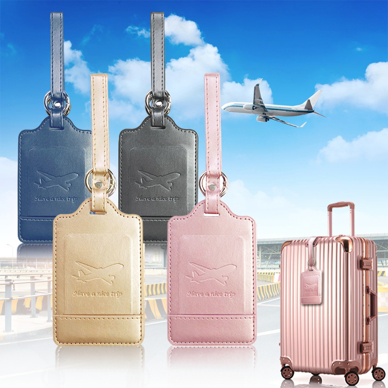 En stock etiqueta de equipaje transfronteriza al por mayor anillo alargado correa de cordón metal fijo PU cuero etiqueta de equipaje