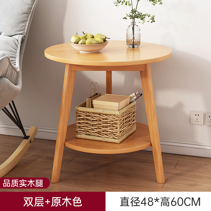 Sofá de la sala de estar pequeña mesa redonda doméstica, estante de cabecera de cama moderno y minimalista, mesa de té creativa con balcón