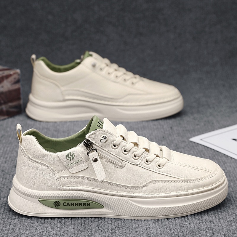 Zapatos de skate para hombres zapatos blancos bajos estudiantes 2025 nuevos zapatos de cuero casuales de primavera para hombres zapatos de moda con cremallera para adolescentes