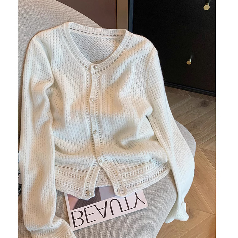 White knitted autumn cardigan