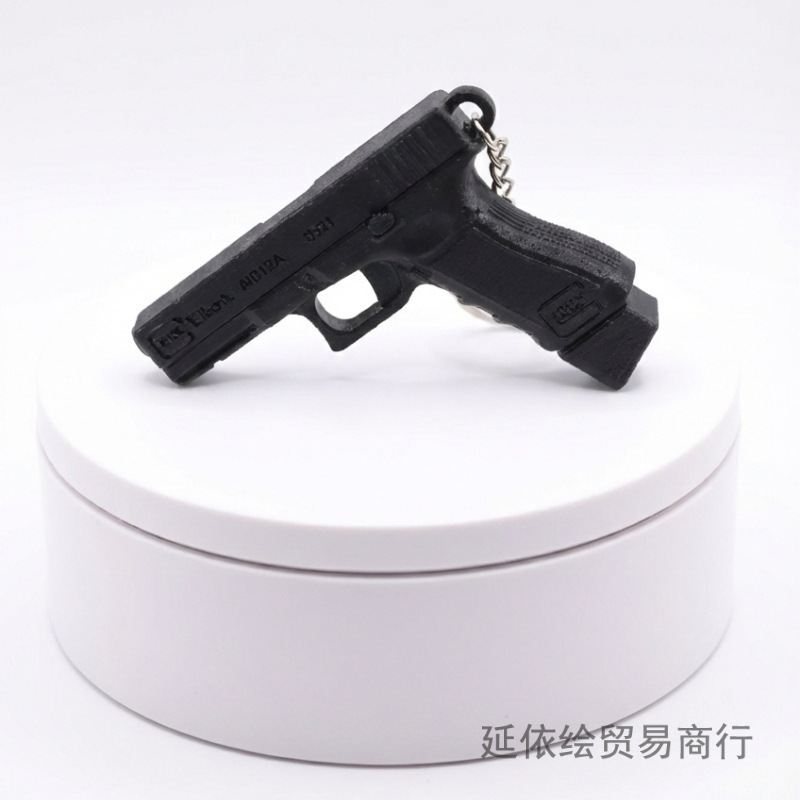 Transición fronteriza explosiva pistola llavero estilo táctico llavero de hombres regalo de descompresión creativo image 4