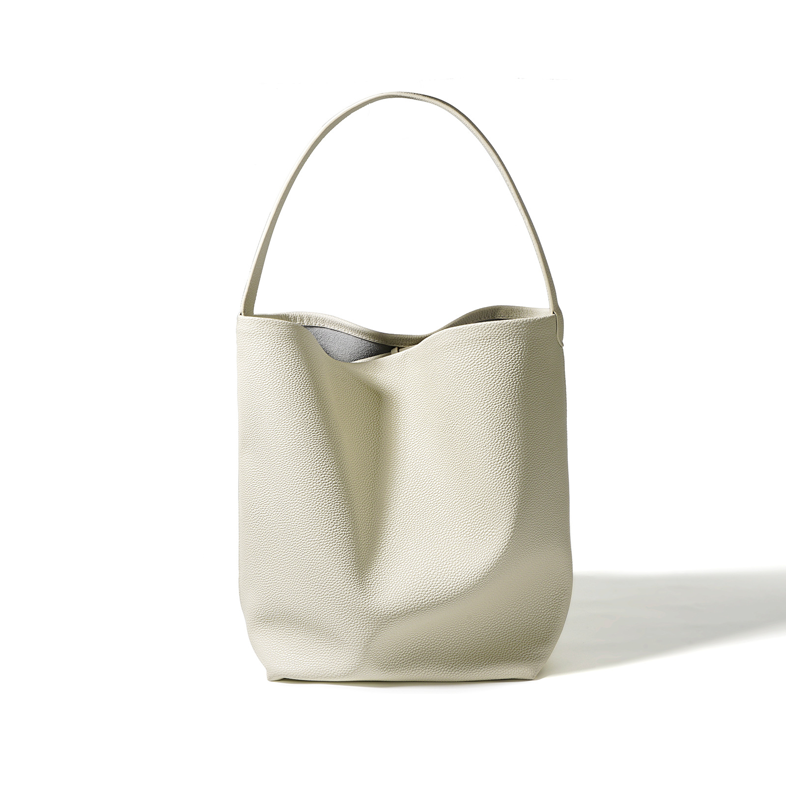 Bolso de cubo de piel de vaca para mujer, gran capacidad, estilo perezoso, hombro, axila, bolso grande 2024 nuevo bolso de ocio