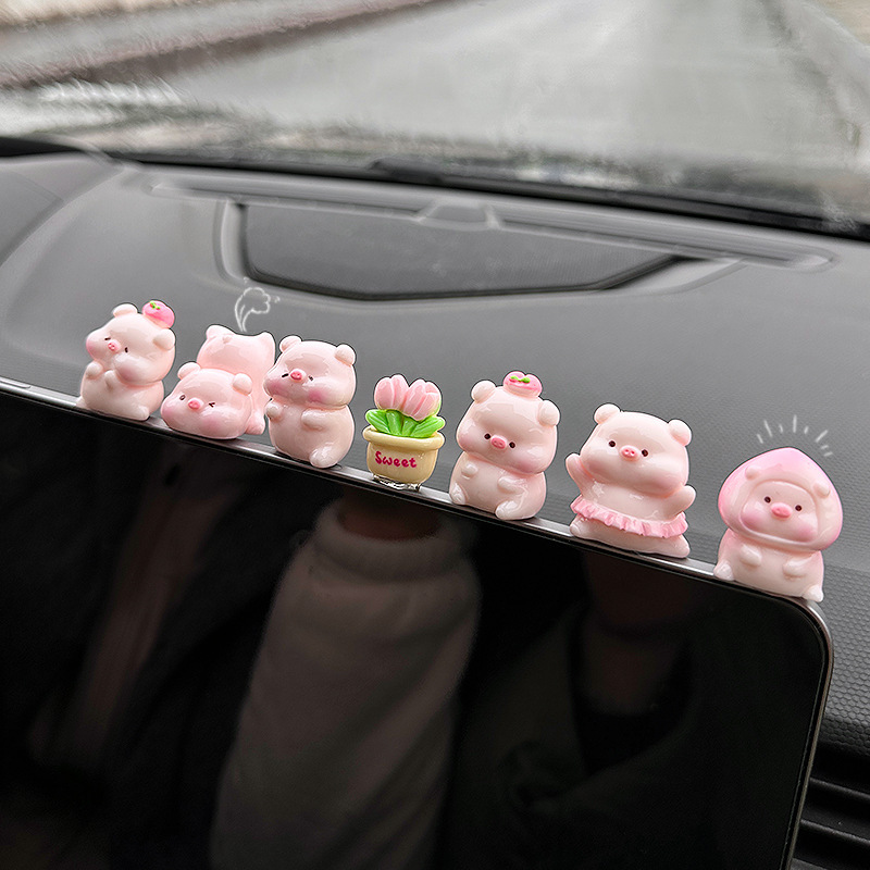 かわいい桃の子豚の車内のアクセサリーは2025の新型の自動車の中でコンソールを解凍して癒します。|undefined