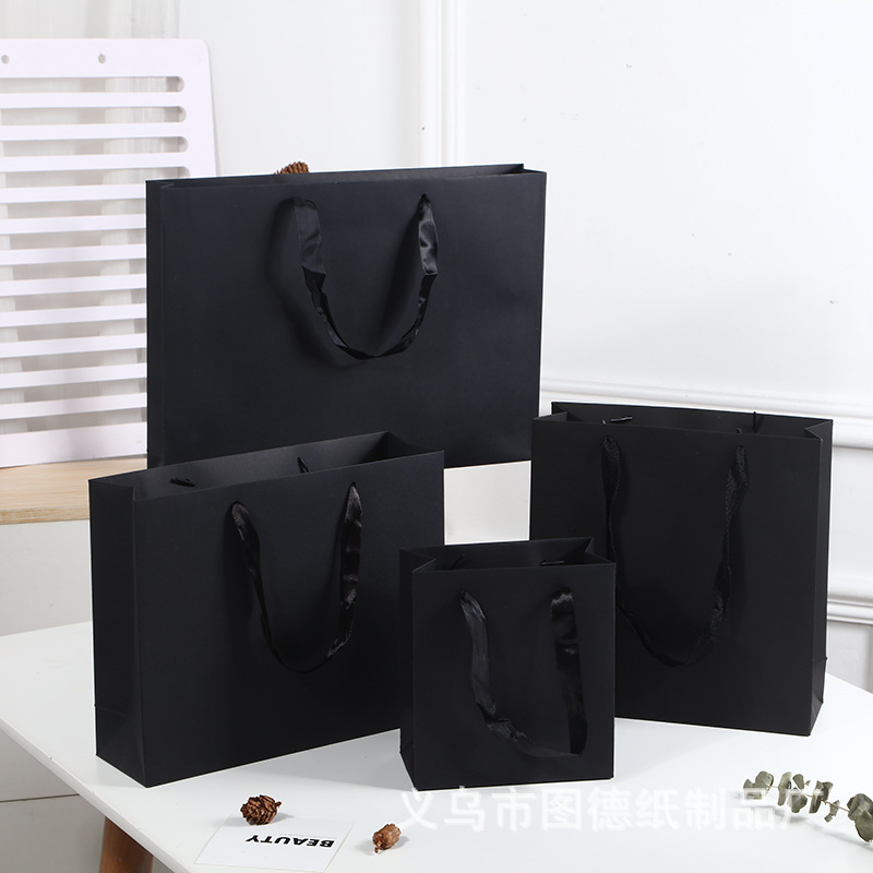现货黑色礼品袋服装购物手提袋黑卡纸袋公司送礼包装袋广告宣传袋