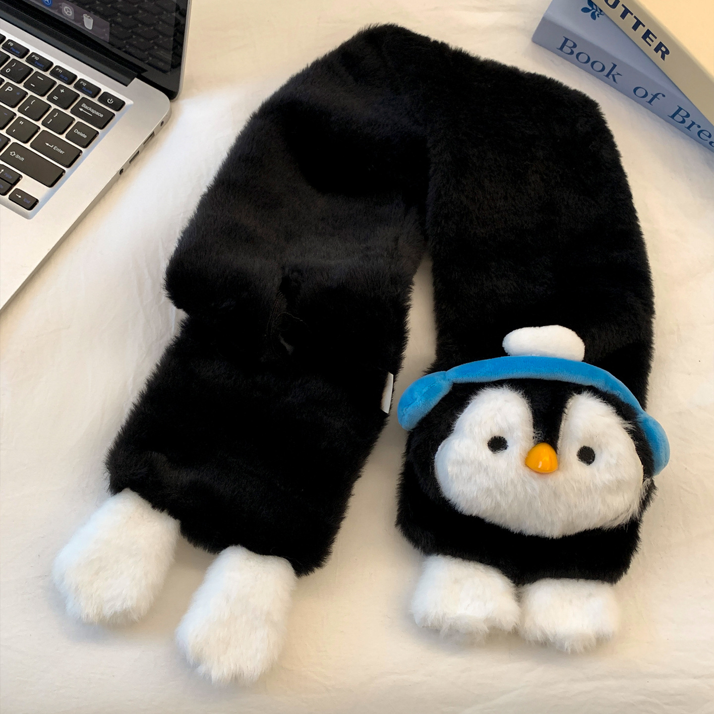 Auriculares negros bufanda de pingüino