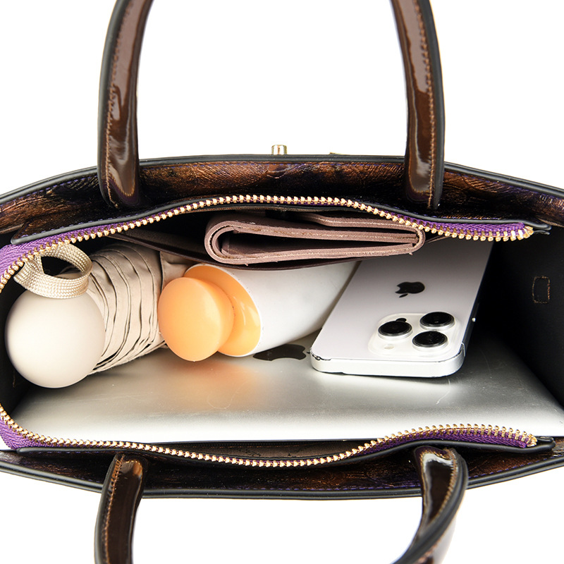 2024 nueva moda impresa bolsos de madres bolsos populares bolsos de hombro de mujer simple bolsos de mano de gran capacidad