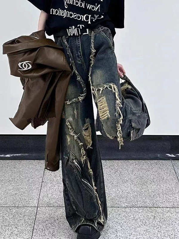 Nahaufnahme einer Jeans mit Quasten