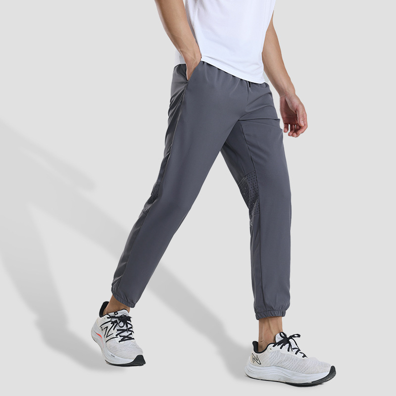 Pantalones deportivos de secado rápido para hombres pantalones casuales de primavera y otoño fitness deportes pista y campo de entrenamiento elástico alto pantalones atados al tobillo
