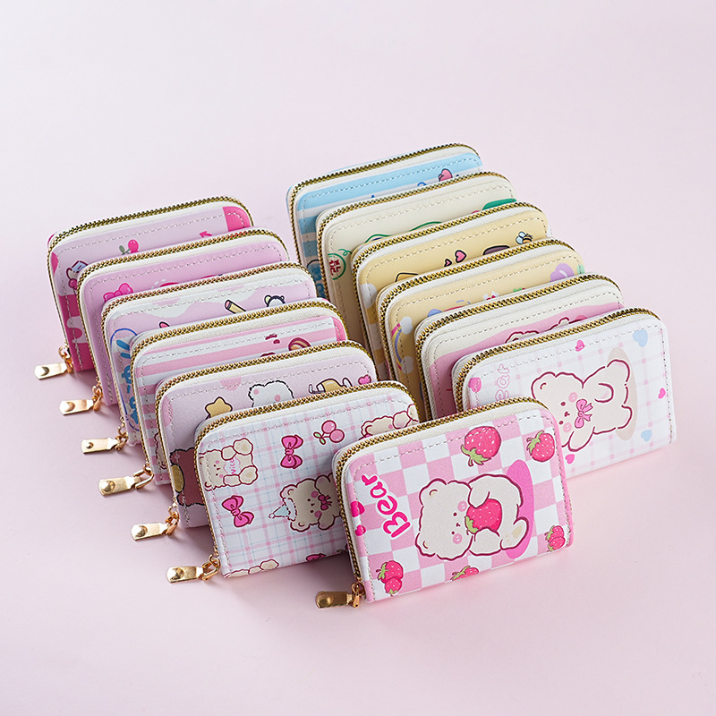 Estilo japonés lindo creativo mini órgano titular de la tarjeta de gran capacidad Multi-tarjeta de dibujos animados hembra anti-desgaussing titular de la tarjeta bancaria