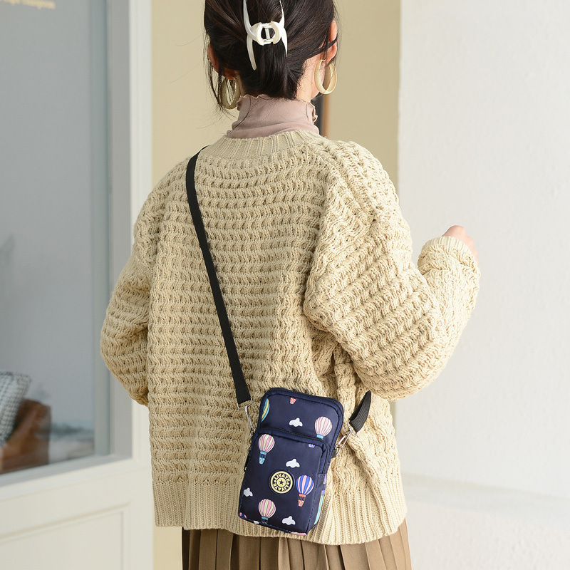 Bolsa de puesto 2021 nueva bolsa de teléfono móvil crossbody bolso de mujer halter teléfono móvil cambio vertical bolsa de brazo corriente