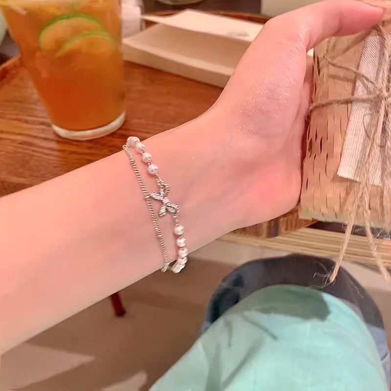 더블 레이어 활 진주 스택 팔찌 여성용 라이트 럭셔리 틈새 절묘한 팔찌 여성용 하이 엔드 학생 손 보석