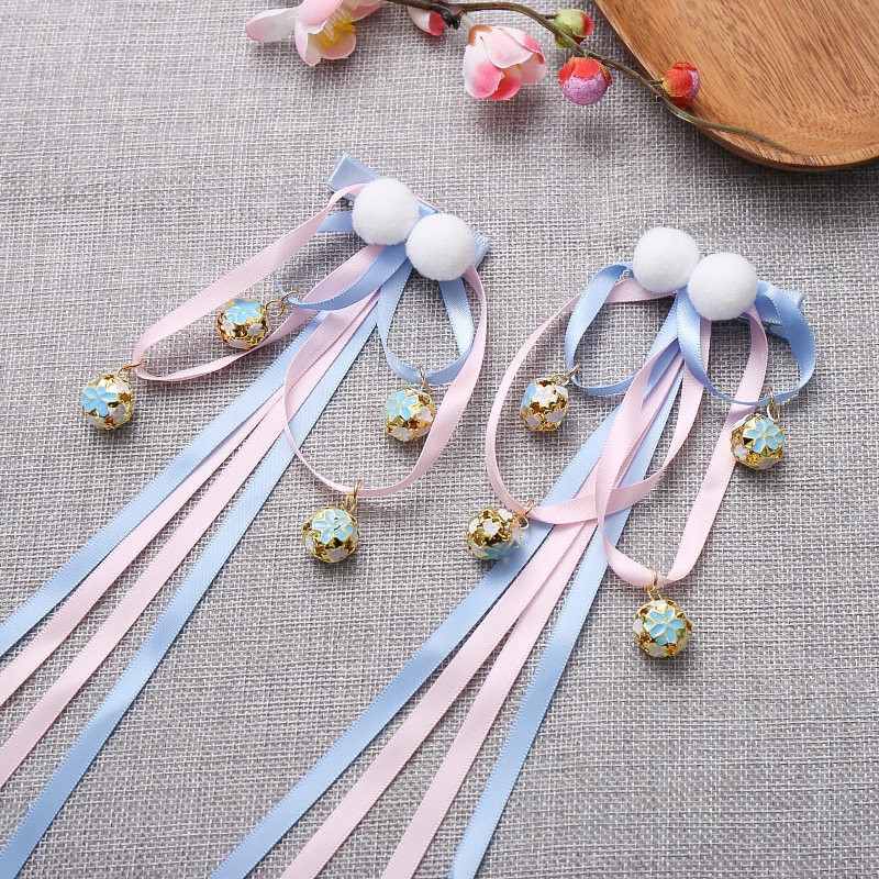 FJ100-11# A pair of light blue fur ball bell hair clips