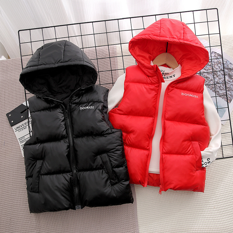 2025 nuevo chaleco con capuz para niños de color sólido en invierno chaleco de algodón grueso para niños otoño y invierno caliente algodón clip de marea