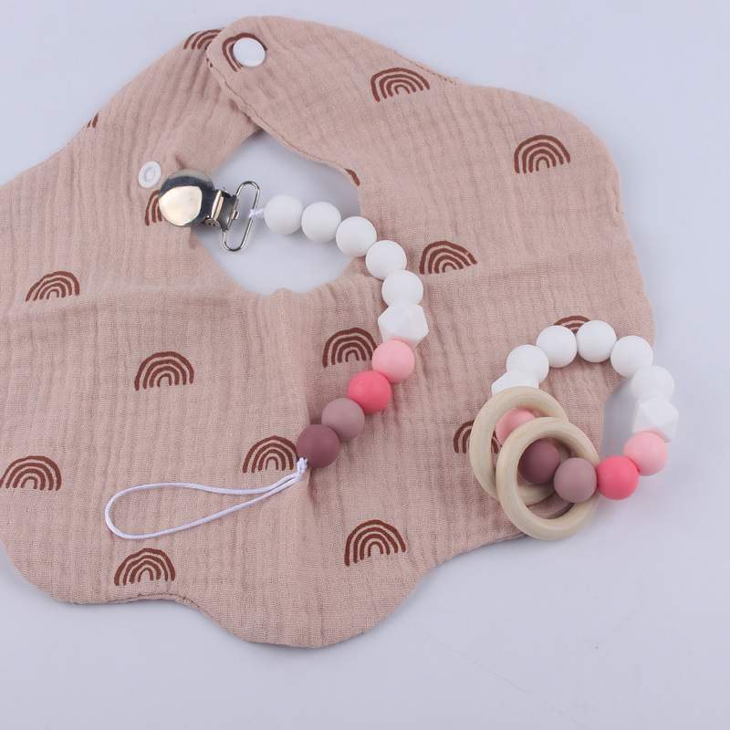 Nuevos suministros para bebés Cadena de chupete DIY creativo contraste color cuentas de silicona mordedor anti-caída traje de cadena