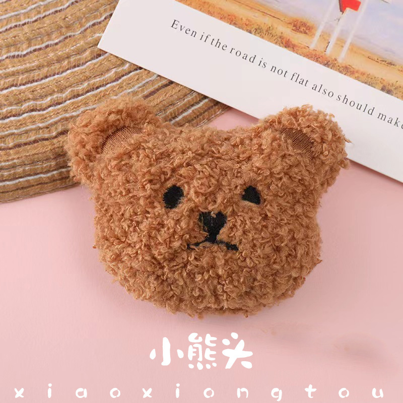 Manufacturers supply all kinds of plush toy head plush pendant teddy bear head doll machine toys Manufacturers supply all kinds of plush toy head plush pendant teddy bear head doll machine toys
