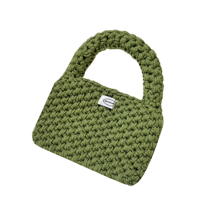 Bolsa de mano de damas de otoño y invierno 2025 nuevo estilo simple ganchillo a mano lana tejido bolsas de hombro al por mayor