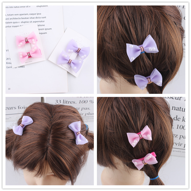 Cute harmless children's hairgrip with bow pearl