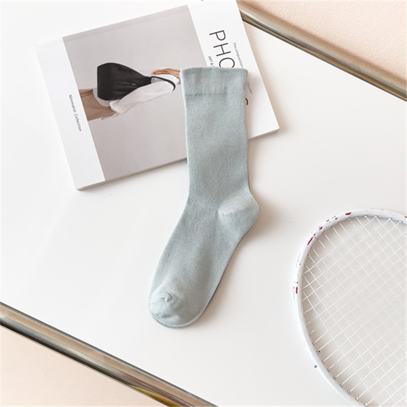 Calcetines de color sólido calcetines de confinamiento de boca suelta de algodón calcetines de pila de media pantorrilla para mujeres al por mayor calcetines de algodón largos transpirables de estilo japonés