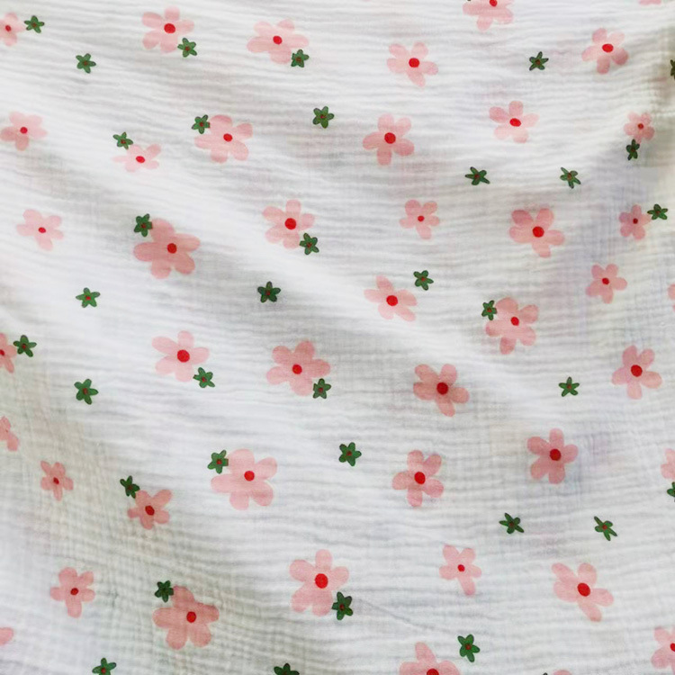 Fabricante de suministro al por mayor de bebés manta algodón impresión de gaza doble tela de ropa de bebé