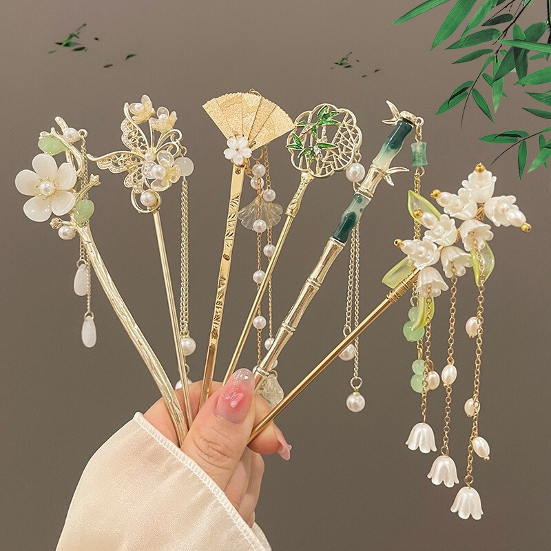 Chinese style tassel hairpin women's high-grade updo exquisite hair plug ancient style hanfu headdress step-shake orchid chopsticks