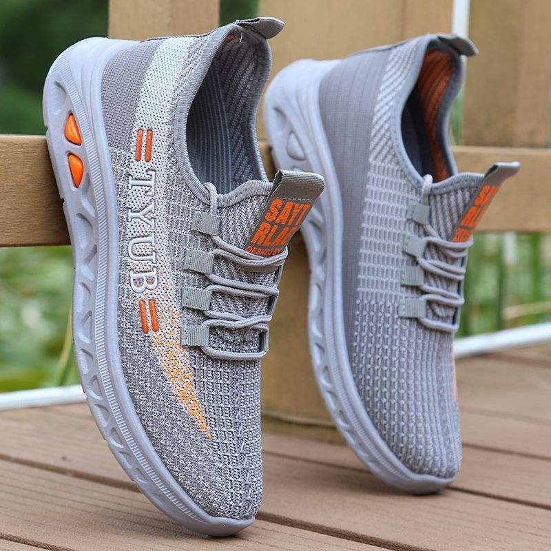 Primavera y verano zapatos de hombre nuevos zapatos de coco de malla de hombre zapatos deportivos de tendencia antiolor zapatos de malla transpirables zapatos de hombre guapo