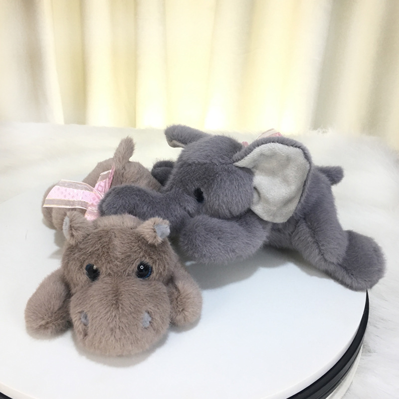Comercio exterior lindo elefante mentiroso muñeca hipopótamo juguete de peluche regalo de boda máquina de agarre muñeca lote transfronterizo