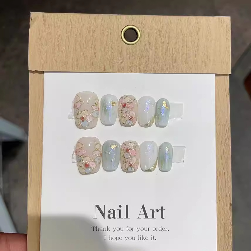 Flores originales como brocado esmalte espejo mágico pequeña flor pura fototerapia hecha a mano desgaste uñas al por mayor pegatinas de uñas desmontables