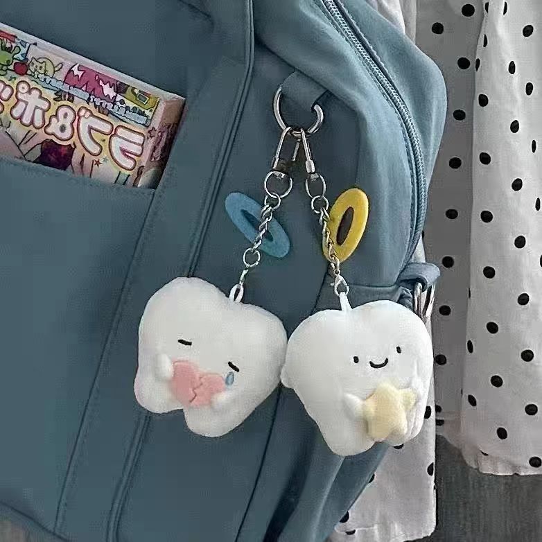 Muñeca de alto valor de ángel diente muñeca corazón roto dientes peludos colgante pareja muñeca regalo llavero