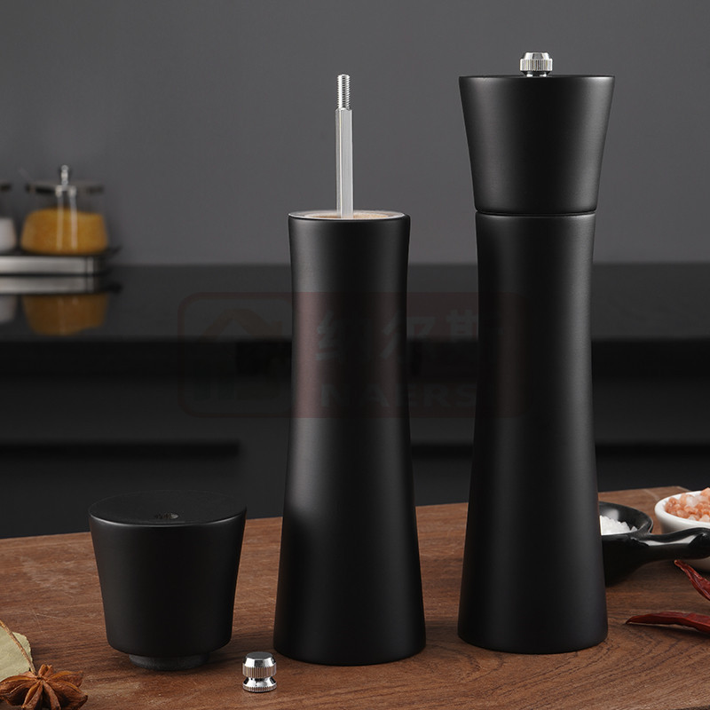 黒い研磨器の台座の小さい腰の胡椒の研磨器の円柱は塩の陶磁器の芯のセットをつぶします。|undefined