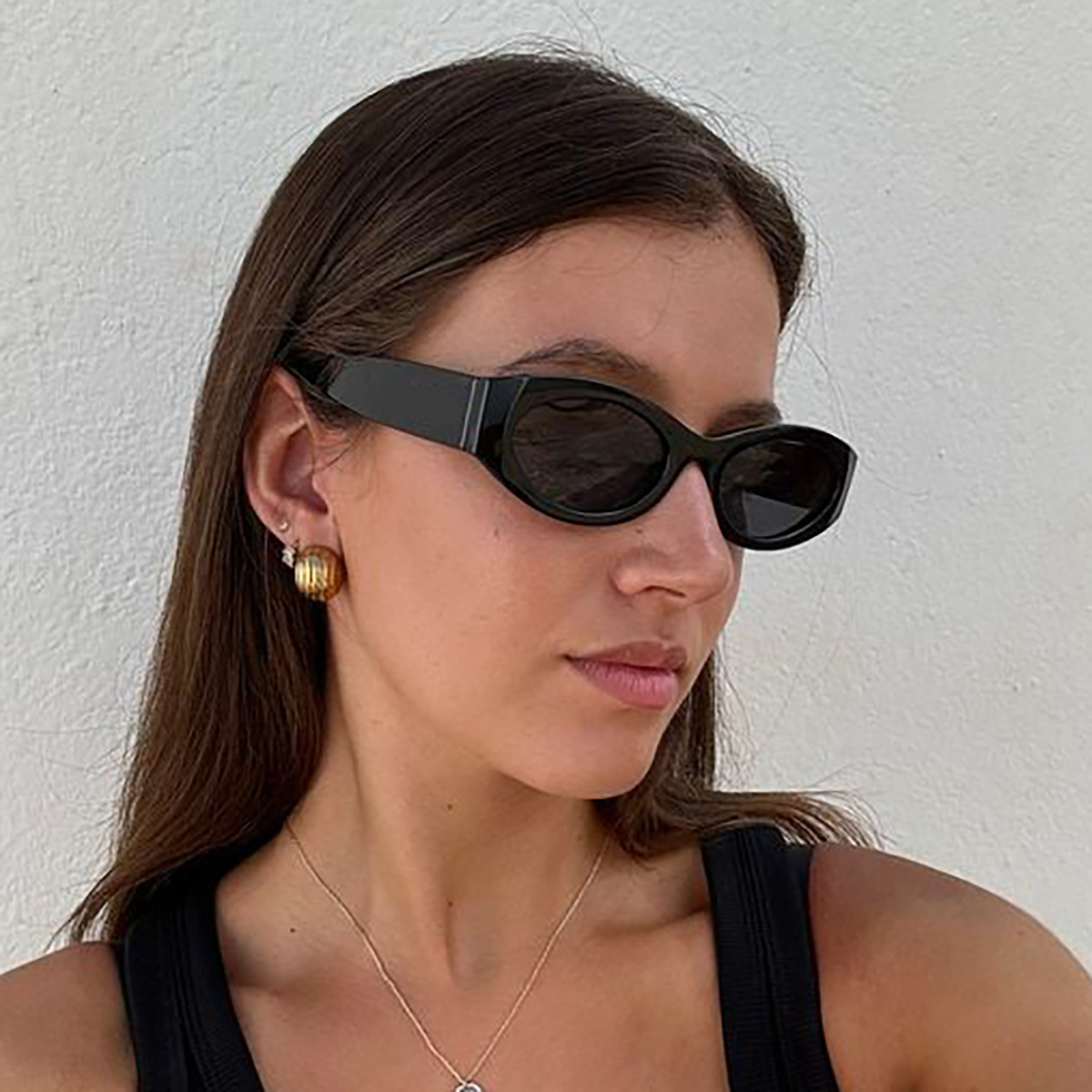 Gafas de sol de tendencia de montura pequeña ovalada retro europea y americana