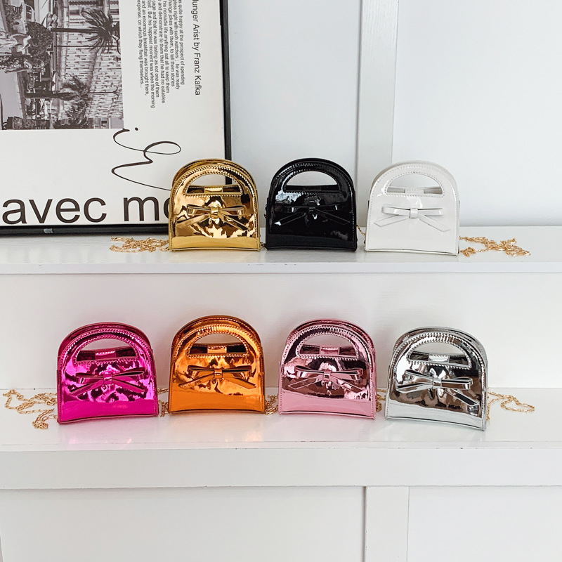 Bolsa de cadena de laca de moda brillante, dulce y lindo, bolso de arco para niñas, bolso para niños de color sólido