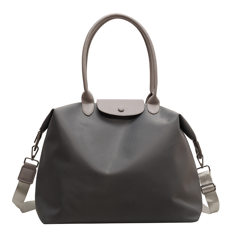 Bolsa de asas de gran capacidad de color sólido 2024 Nueva bolsa de viaje crossbody bolsa de equipaje de viaje de negocios de estilo coreano bolsa de almacenamiento simple