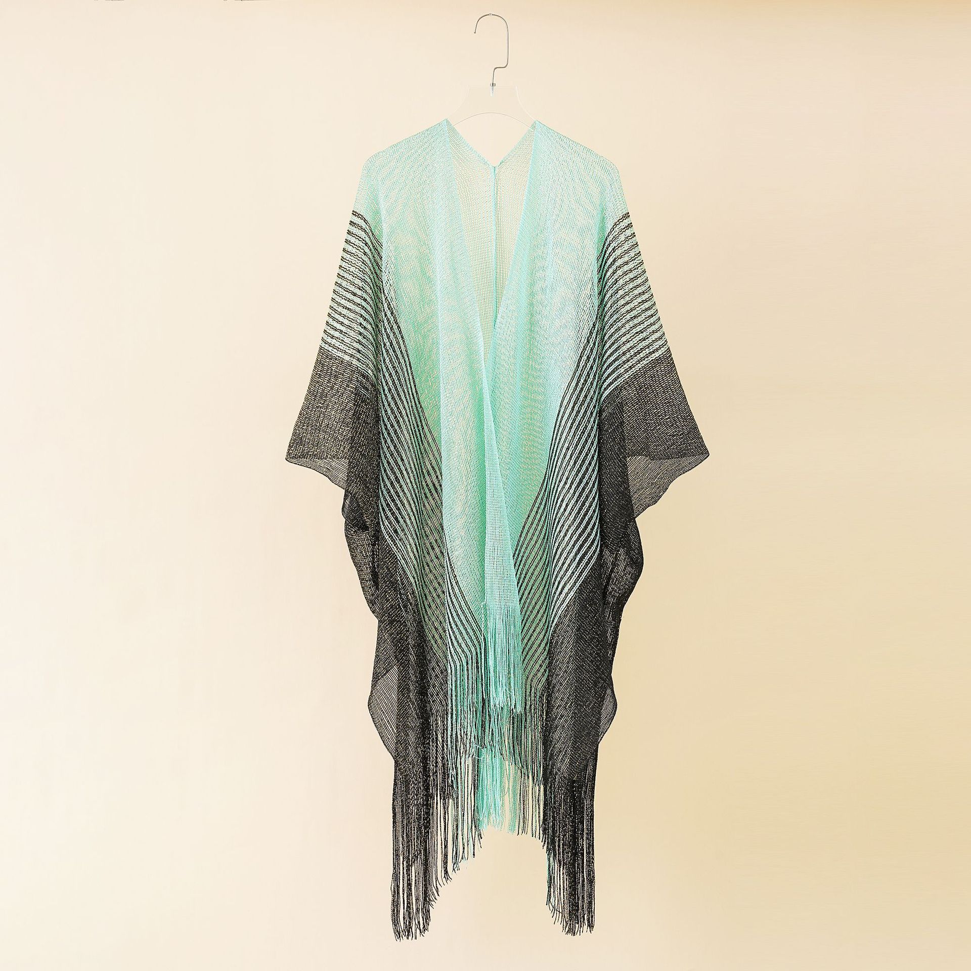 Verano nuevo hueco color matching punto borla chal vacaciones blusa borla hueco playa traje de baño blusa