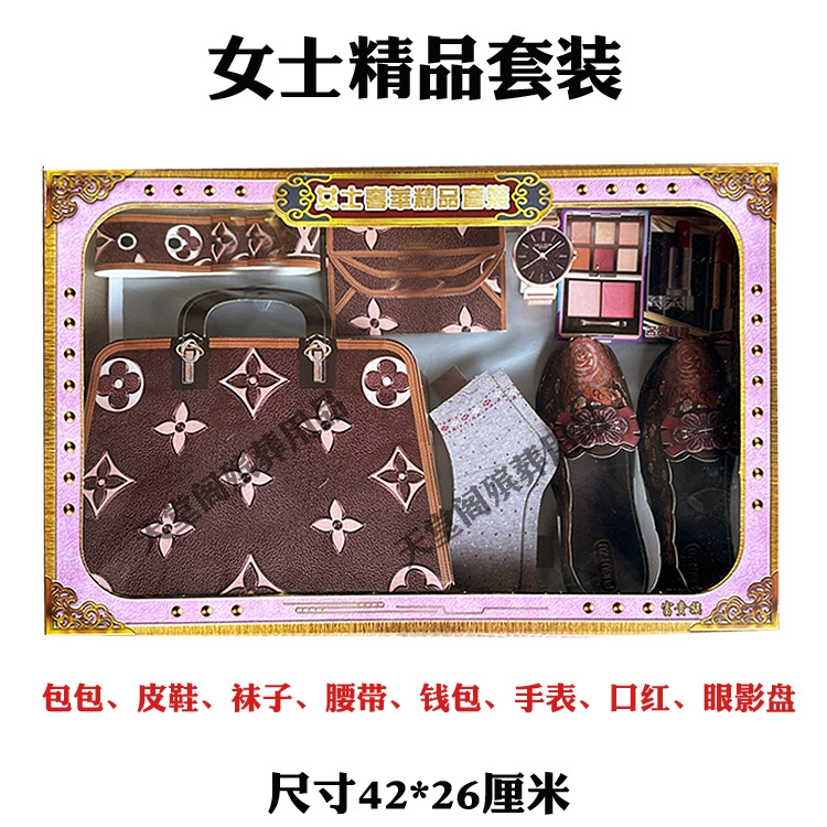 Женская обувь, сумка и ювелирная коробка на могиле