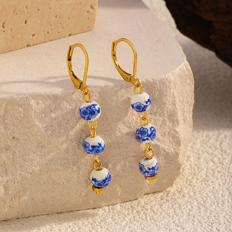 Europa y los Estados Unidos más vendidos antiguos aretes de cerámica azul y flor serie de aretes de cerámica nuevos aretes de estilo chino diseño temperamento estilo anillo redondo