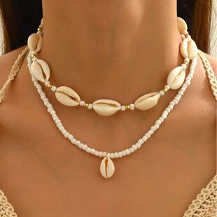 European and American cross -border beach wind accessories stacking rice bead shell shell necklace foot chain retro personality rice bead jewelry set