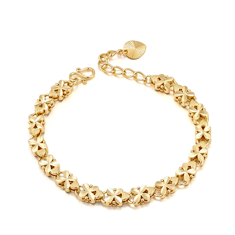 Xuping Europa y los Estados Unidos transfronterizos cuatro hojas de flores amor pulsera de oro de aleación de cobre ligera joyas de lujo al por mayor personalizadas image 6