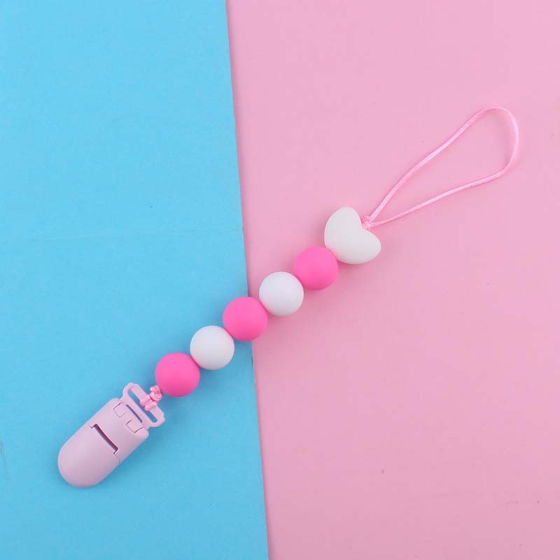 Nuevo bebé suministros de dibujos animados amor silicona DIY creativo macaron color serie mordedura cola molar pezón