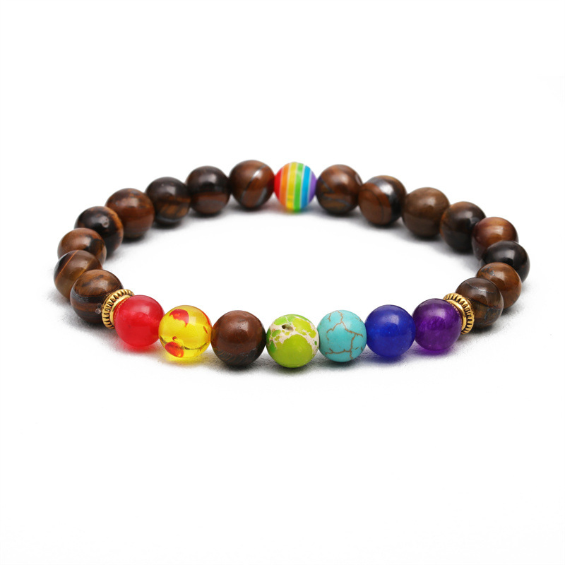 Cuentas de colores transfronterizas europeas y americanas Ojo de tigre Pulsera de cuentas de piedra volcánica pulsera de bola de color pulsera de hombres y mujeres pulsera de pareja