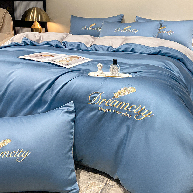 Juego de cuatro piezas de seda de hielo de alta calidad, cama de seda de lujo ligera, funda de edredón para dormir desnuda, sábana de tres piezas de primavera y verano