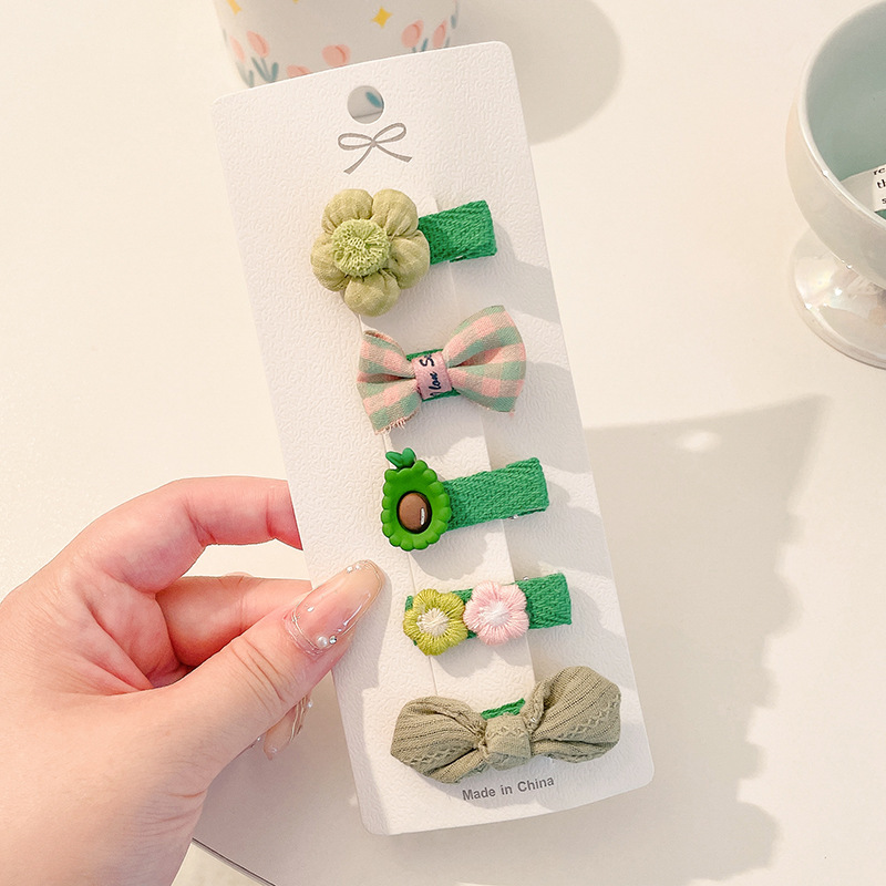 Hermosos clips de cabello de color para niños coreanos de alto nivel sensación de arco de niñas bolsa de tela no daña clips de cabello de bebé