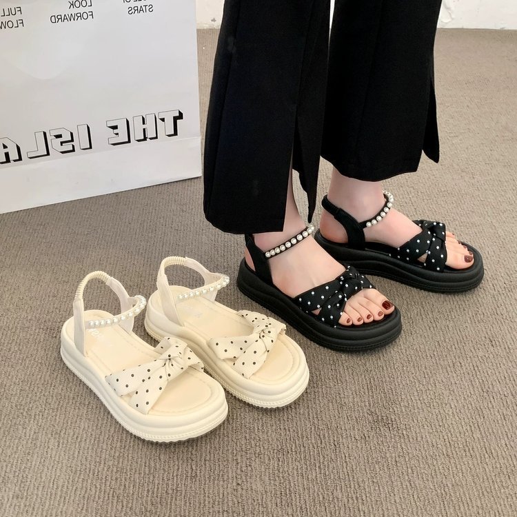 Punto de ondas de alto nivel de sensación de sandálias de suela gruesa para mujeres 2026 nuevo verano suave estilo francés de hadas zapatos de perlas romanas