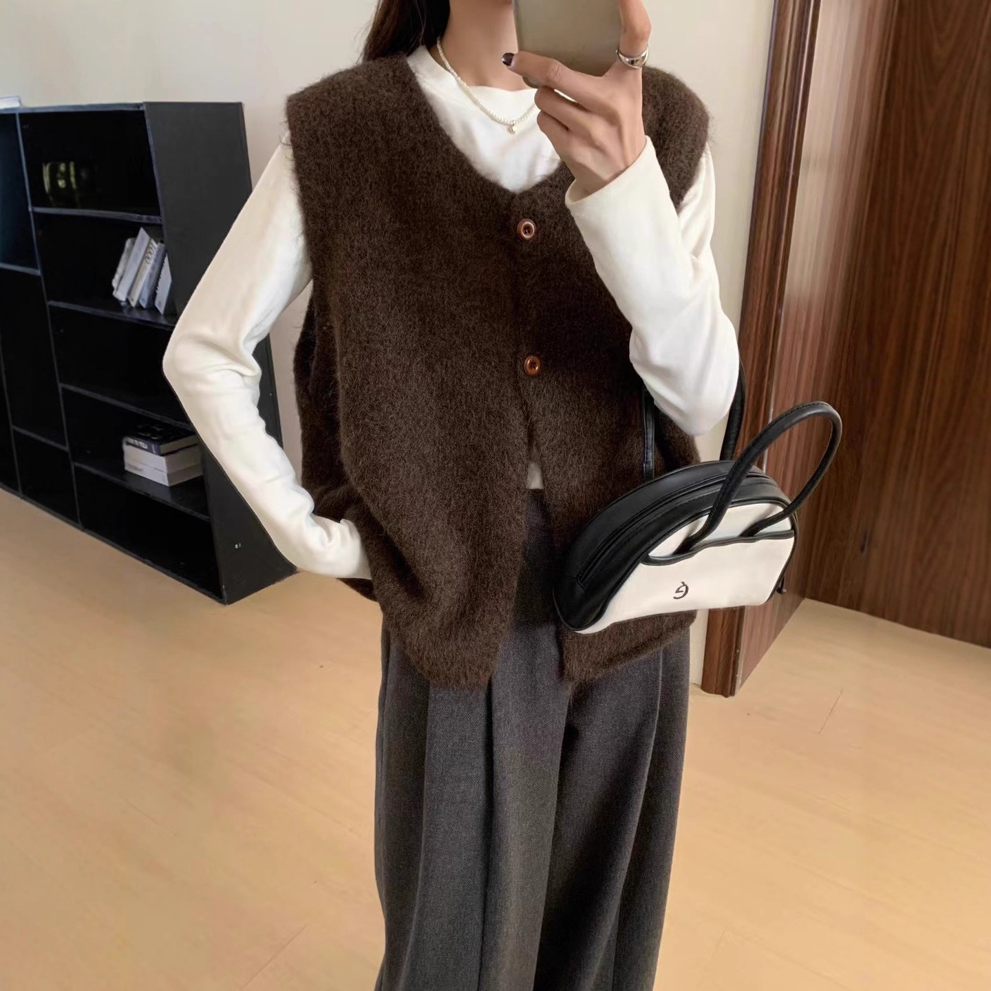 Coreano simple suéter universal chaleco de mujer 2025 otoño invierno nuevo suelto plegado chaleco de punto temperamento viaje image 5