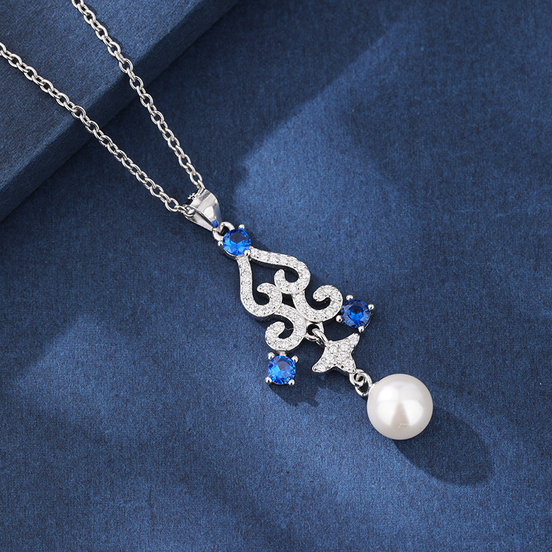 Collar de perlas de flor hueca de plata de ley 925 para mujer transfronteriza europea y americana elegante temperamento de moda con incrustaciones de cuentas de concha de circón