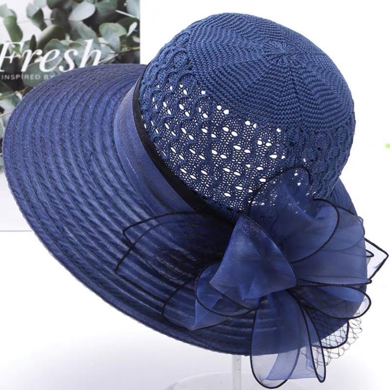 夏季遮阳帽女时尚镂空针织顶拼接花朵大沿帽韩版欧美台湾丝太阳帽