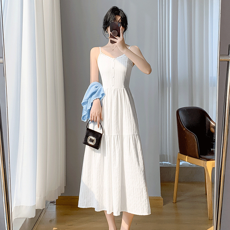 Korean-Style Gentle First Love Dress, Spaghetti Strap Dress for Women, New Spring Model for Seaside Vacation, Slimming and Elegant Long Dress with Ruffles Korean-Style Gentle First Love Dress, Spaghetti Strap Dress for Women, New Spring Model for Seaside Vacation, Slimming and Elegant Long Dress with Ruffles